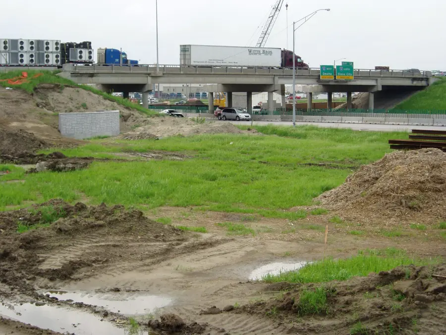 New ramps taking shape beside an existing interchange.
