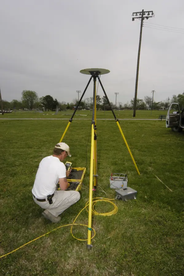 A surveyor works through a stakeout on the data collector.