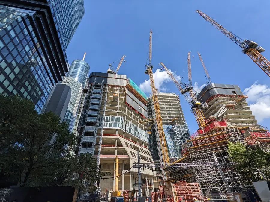 New towers rising among a city of cranes.